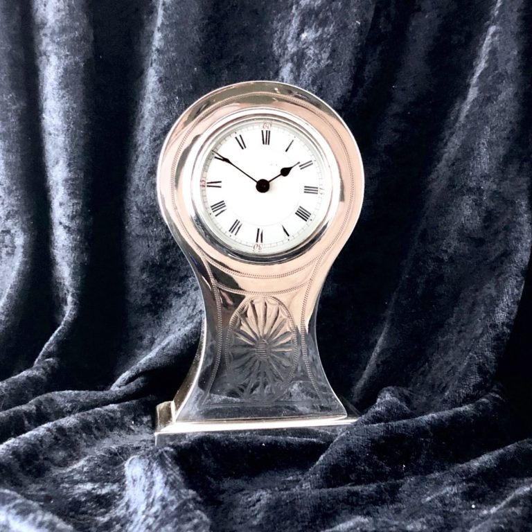 An Edwardian Silver Mantel Clock