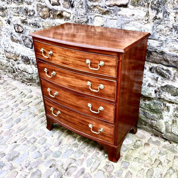 A Small Mid Victorian Mahogany Bowfront Chest Of Drawers