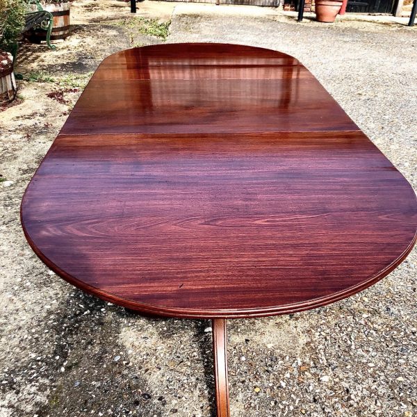 An Edwardian Mahogany Twin Pedestal Dining Table