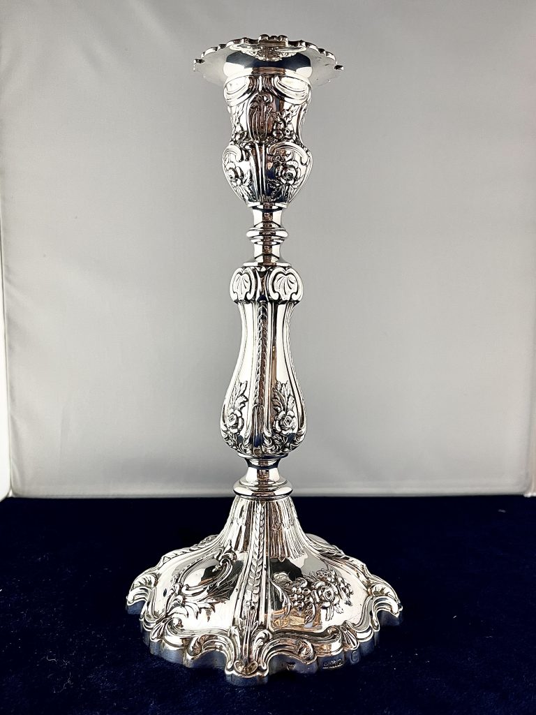 A Baroque Style Silver Candlestick