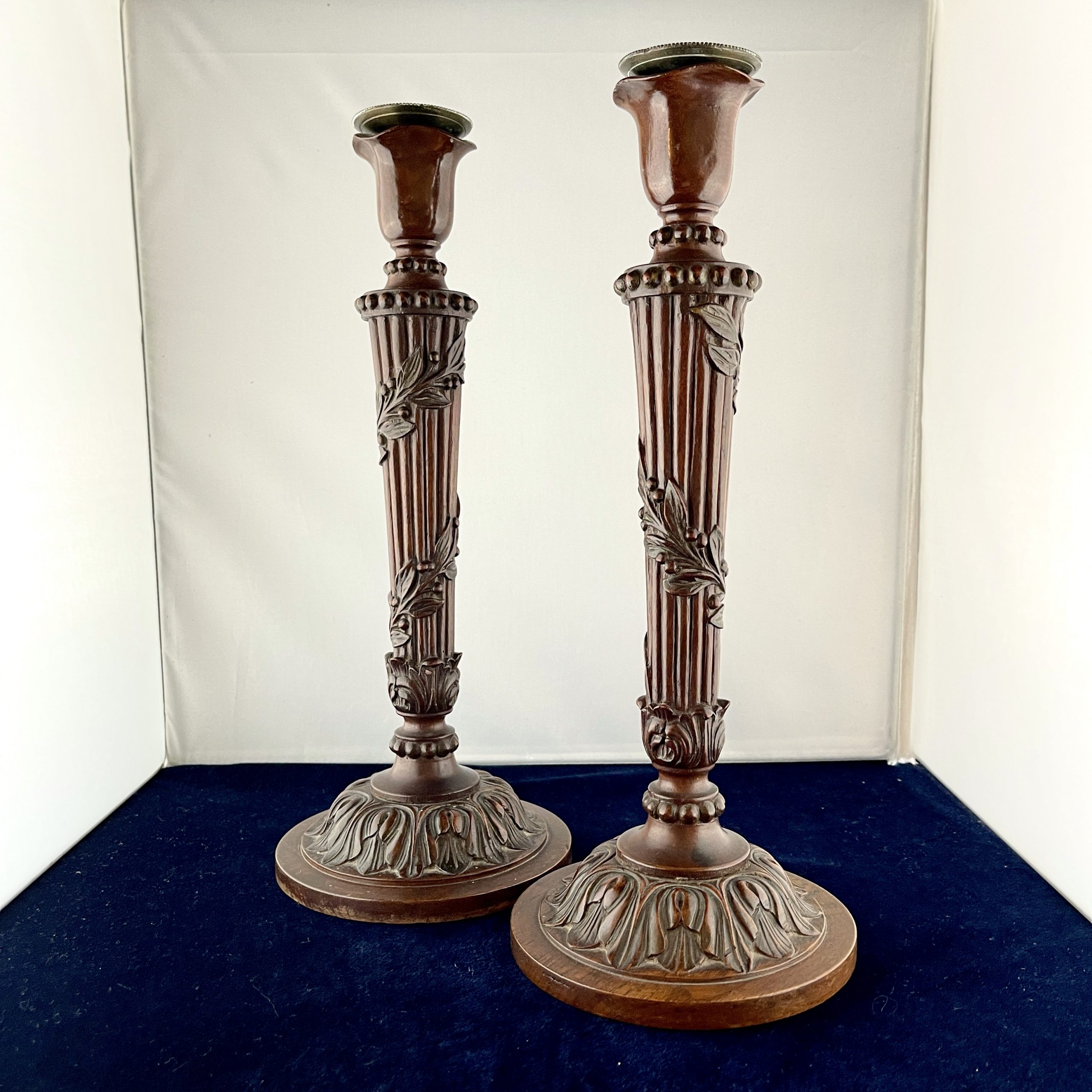A Pair of Louis XVI Style Mahogany Candlesticks