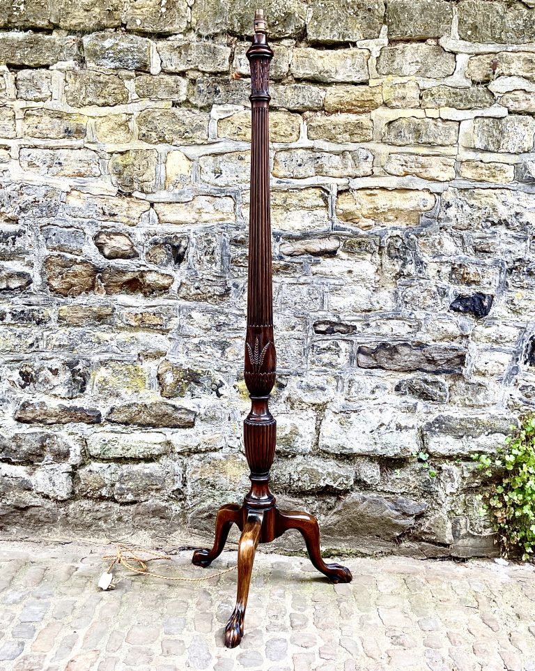 An Edwardian mahogany standard lamp