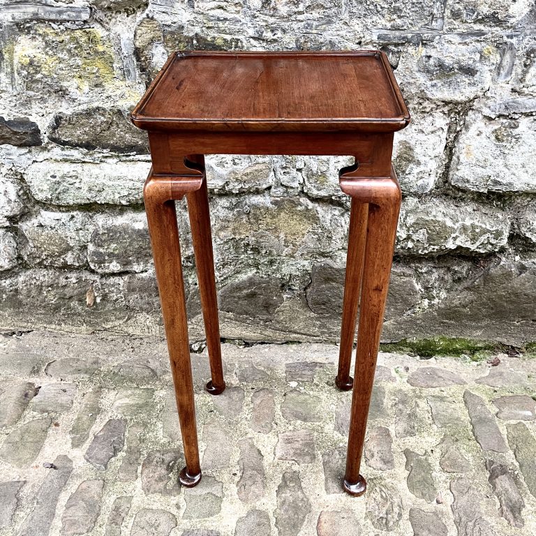 An Early 20th Century Walnut Lamp Table