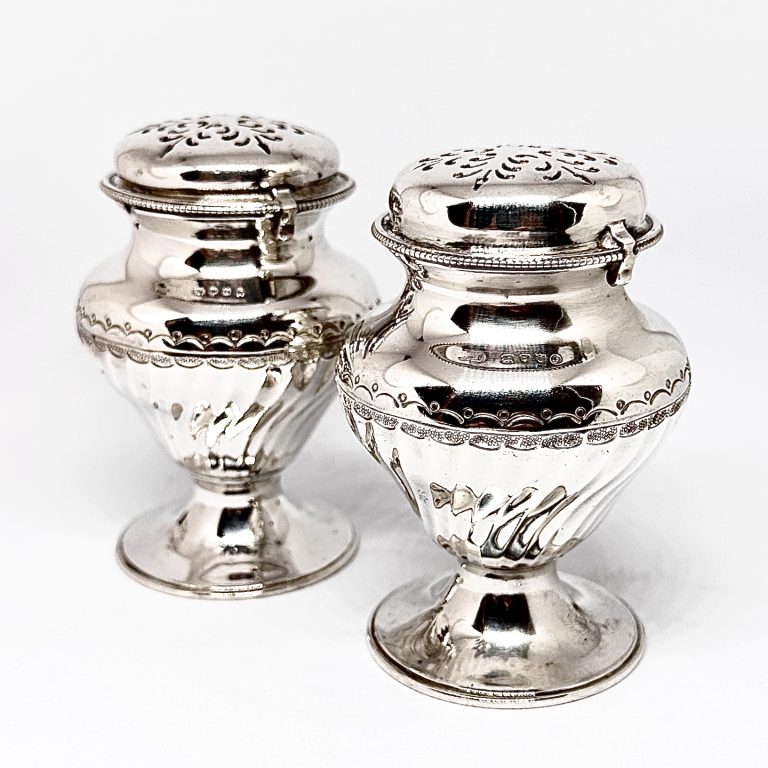 A Pair of Late Victorian Silver Pepper Pots