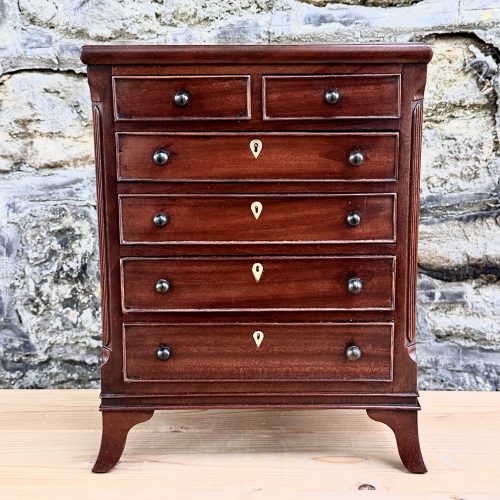 A Fine George III Miniature Chest of Drawers